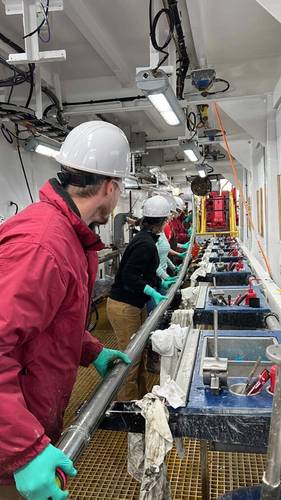 Core on deck! A full core arrives on the catwalk. © Jennifer Field & IODP