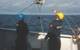 Figure 2: The benthic lander Audacia is raised over the side for deployment by the deck crew of the modern Chilean scientific vessel Cabo de Hornos, operated by the Chilean Armada.  The glass spheres put bouyancy high, while the instruments put the weight low, creating inherent stability. (Image: Courtesy Kevin Hardy and Atacamex 2018)
