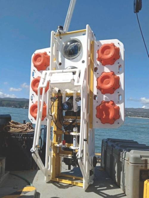 A hadal-class ocean lander, designed and built by the Universidad de Concepción (UdeC), Centro de Instrumentación Oceanográfica, is seen during buoyancy testing on the RV Kay-Kay in Dichato Bay, 38 kilometers north of the city of Concepción, in central Chile. The proximity and challenge of the Atacama Trench relentlessly draw UdeC engineers and scientists. Their ocean lander can downcast as a CTD-O in descent, remain in situ for extended periods on the trench floor, then upcast as a CTD-O/Rosett
